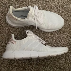 Never worn. White adidas with rose gold detail.